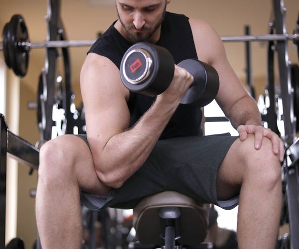 A man looking energetic and focused after a workout session.